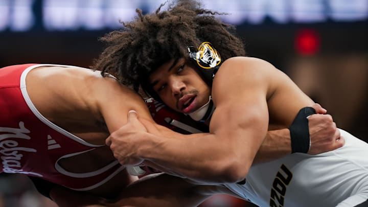 Mar 20, 2026; Cleveland, OH, USA; Nebraska Cornhuskers Christopher Minto competes against Missouri Tigers Cam Steed during the NCAA DI Wrestling Championship at Rocket Arena. Mandatory Credit: Aaron Doster-Imagn Images Mar 20, 2026; Cleveland, OH, USA; Nebraska Cornhuskers Christopher Minto competes against Missouri Tigers Cam Steed during the NCAA DI Wrestling Championship at Rocket Arena. Mandatory Credit: Aaron Doster-Imagn Images