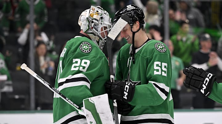 Dec 8, 2024; Dallas, Texas, USA; Dallas Stars goaltender Jake Oettinger (29) and defenseman Thomas Harley (55) celebrate the Stars victory over the Calgary Flames at the American Airlines Center. Mandatory Credit: Jerome Miron-Imagn Images