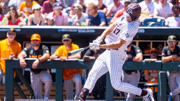 Jun 23, 2024; Omaha, NE, USA; Texas A&M Aggies right fielder Jace Laviolette (17) hits a home run against the Tennessee Volunteers during the first inning at Charles Schwab Field Omaha. Mandatory Credit: Dylan Widger-Imagn Images