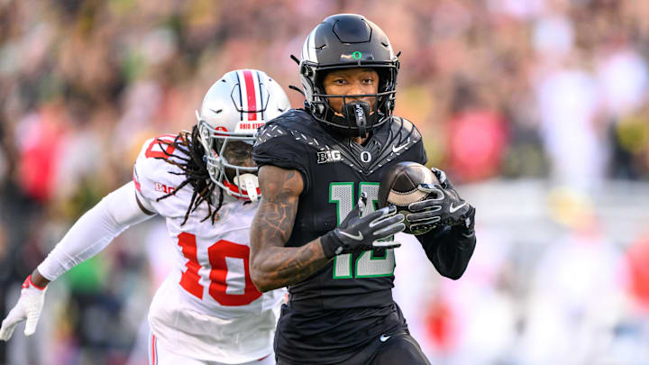 Oct 12, 2024; Eugene, Oregon, USA; Oregon Ducks wide receiver Tez Johnson (15) makes a catch for a touchdown during the second quarter against the Ohio State Buckeyes at Autzen Stadium. Mandatory Credit: Craig Strobeck-Imagn Images