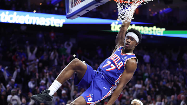 Jan 5, 2026; Philadelphia, Pennsylvania, USA; Philadelphia 76ers guard Vj Edgecombe (77) dunks the ball against the Denver Nuggets during overtime at Xfinity Mobile Arena. Mandatory Credit: Bill Streicher-Imagn Images