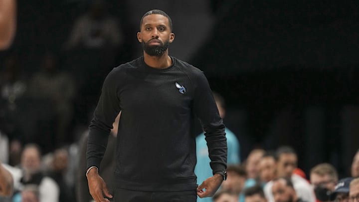 Dec 12, 2025; Charlotte, North Carolina, USA; Charlotte Hornets head coach Charles Lee looks on during the first quarter against the Chicago Bulls at Spectrum Center. Mandatory Credit: Jim Dedmon-Imagn Images