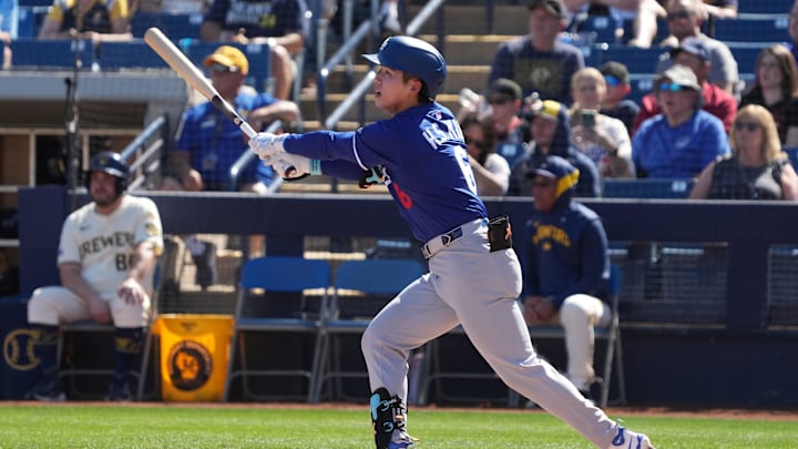 Phoenix, Arizona, USA; Los Angeles Dodgers second base Hyeseong Kim (6) hits against the Milwaukee Brewers during the third inning at American Family Fields of Phoenix.