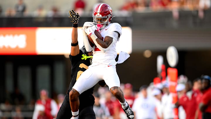 Oct 5, 2024; Nashville, Tennessee, USA;  Alabama Crimson Tide wide receiver Ryan Williams (2) makes a catch over Vanderbilt Commodores cornerback Jaylin Lackey (27) during the second half at FirstBank Stadium. Mandatory Credit: Steve Roberts-Imagn Images