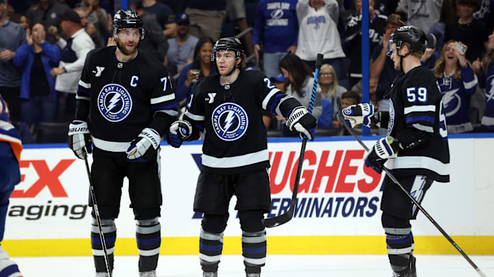 Tampa Bay Lightning center Brayden Point celebrates with defenseman Victor Hedman and center Jake Guentzel. Tampa Bay Lightning center Brayden Point celebrates with defenseman Victor Hedman and center Jake Guentzel.