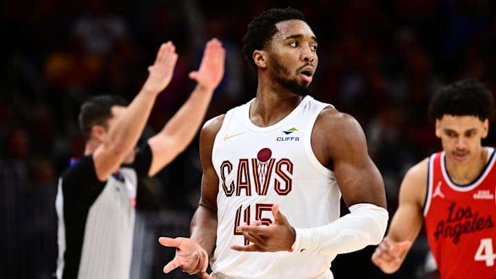 Nov 23, 2025; Cleveland, Ohio, USA; Cleveland Cavaliers guard Donovan Mitchell (45) celebrates after hitting a three point basket against the Los Angeles Clippers during the second half at Rocket Arena. Mandatory Credit: Ken Blaze-Imagn Images