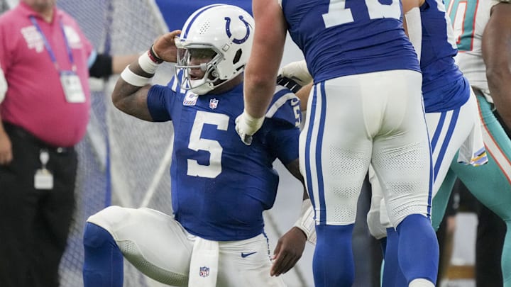 Oct 20, 2024; Indianapolis, Indiana, USA;  Indianapolis Colts quarterback Anthony Richardson (5) celebrates after rushing the ball during a game against the Miami Dolphins at Lucas Oil Stadium. Mandatory Credit: Christine Tannous/IndyStar USA TODAY Network via Imagn Images