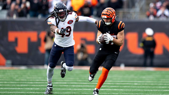 Tremaine Edmunds gives chase to Tanner Hudson in the Bears' win over Cincinnati.
