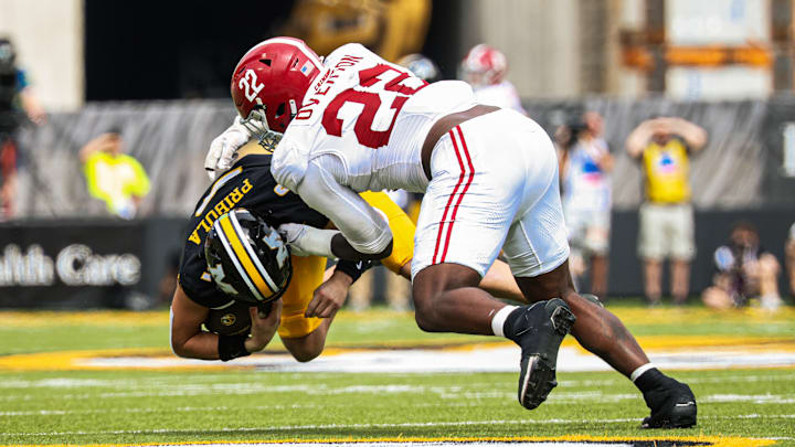 Alabama BANDIT LT Overton tackles Missouri quarterback Beau Pribula Alabama BANDIT LT Overton tackles Missouri quarterback Beau Pribula