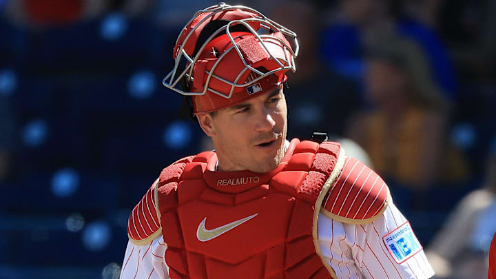 Mar 4, 2026; Clearwater, FL, USA; Philadelphia Phillies catcher J.T. Realmuto (10) looks on during the second inning against Team Canada at BayCare Ballpark.
