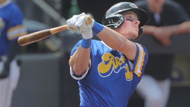 RubberDucks' Travis Bazzana follows a long fly ball to the wall in a game against the Altoona Curve on April 13, 2025, in Akron, Ohio. RubberDucks' Travis Bazzana follows a long fly ball to the wall in a game against the Altoona Curve on April 13, 2025, in Akron, Ohio.