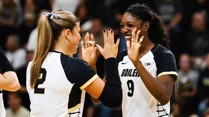 Purdue's Dior Charles celebrates with MaryKate Scheumann. Purdue's Dior Charles celebrates with MaryKate Scheumann.