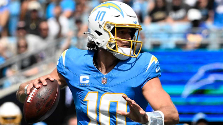 Sep 15, 2024; Charlotte, North Carolina, USA;  Los Angeles Chargers quarterback Justin Herbert (10) looks to pass in the second quarter at Bank of America Stadium. Mandatory Credit: Bob Donnan-Imagn Images