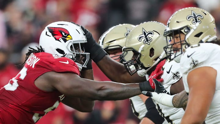 Arizona Cardinals defensive tackle Darius Robinson (56) rushes the line during a preseason game on Aug. 10, 2024 at State Farm Stadium in Glendale. Arizona Cardinals defensive tackle Darius Robinson (56) rushes the line during a preseason game on Aug. 10, 2024 at State Farm Stadium in Glendale.