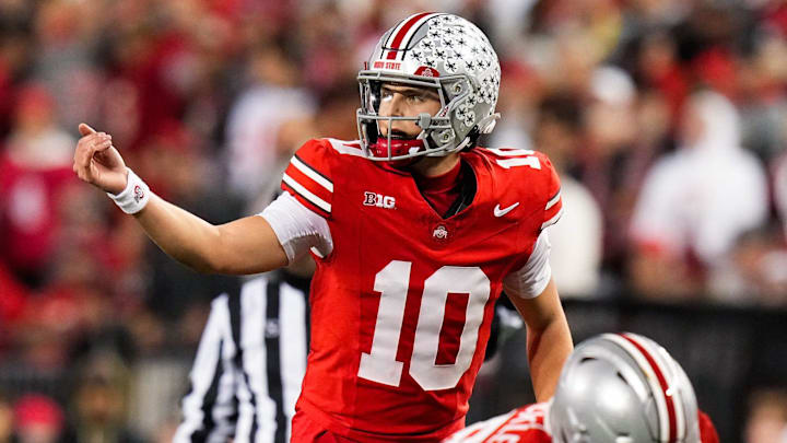 Ohio State Buckeyes quarterback Julian Sayin (10) speaks to his teammates in the second half of the NCAA college football game at Ohio Stadium on Saturday, Nov. 15, 2025 in Columbus, Ohio.