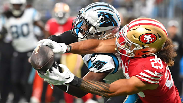 Oct 9, 2022; Charlotte, North Carolina, USA; Carolina Panthers wide receiver Shi Smith (12) attempts to catch the ball as San Francisco 49ers safety Talanoa Hufanga (29) defends in the fourth quarter at Bank of America Stadium. Oct 9, 2022; Charlotte, North Carolina, USA; Carolina Panthers wide receiver Shi Smith (12) attempts to catch the ball as San Francisco 49ers safety Talanoa Hufanga (29) defends in the fourth quarter at Bank of America Stadium.