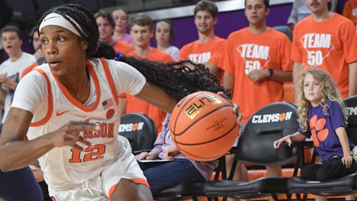 Clemson guard Mia Moore (12) dribbles playing Jackson State University during the first quarter at Littlejohn Coliseum in Clemson, S.C. Monday, Nov 4, 2024. Clemson guard Mia Moore (12) dribbles playing Jackson State University during the first quarter at Littlejohn Coliseum in Clemson, S.C. Monday, Nov 4, 2024.