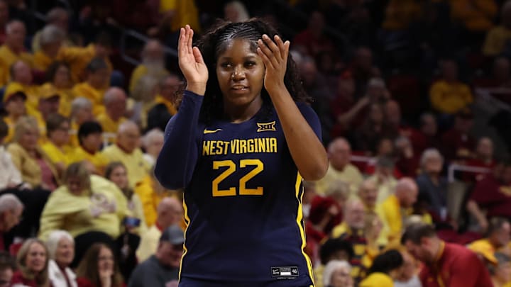 Jan 11, 2026; Ames, Iowa, USA; West Virginia Mountaineers forward Kierra Wheeler (22) celebrates after they beat the Iowa State Cyclones during the second half at James H. Hilton Coliseum. Mandatory Credit: Reese Strickland-Imagn Images Jan 11, 2026; Ames, Iowa, USA; West Virginia Mountaineers forward Kierra Wheeler (22) celebrates after they beat the Iowa State Cyclones during the second half at James H. Hilton Coliseum. Mandatory Credit: Reese Strickland-Imagn Images