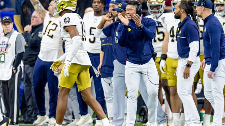 Notre Dame Fighting Irish head coach Marcus Freeman reacts to a play against the Georgia Bulldogs Notre Dame Fighting Irish head coach Marcus Freeman reacts to a play against the Georgia Bulldogs
