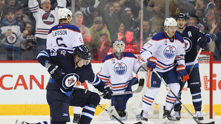 Dec 1, 2016; Winnipeg, Manitoba, CAN; Winnipeg Jets Patrick Laine (29) celebrates his second goal of the game in the third period  during  the NHL hockey game against the Edmonton Oilers at MTS Centre. Edmonton Oilers win 6-3 Mandatory Credit: Ray Peters-Imagn Images