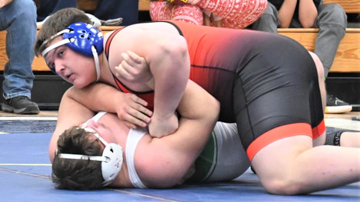 Chris Belmonte of New Hartford works to pin Herkimer's Ross Richard for the 285-pound title at Central Valley Academy's 50th Leo J. Sammon Memorial Tournament on Jan. 3. Chris Belmonte of New Hartford works to pin Herkimer's Ross Richard for the 285-pound title at Central Valley Academy's 50th Leo J. Sammon Memorial Tournament on Jan. 3.