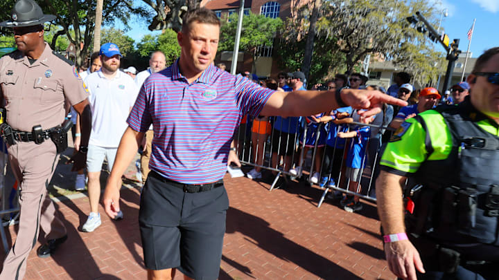 Florida Head Coach Jon Sumrall greats fans as he heads to the locker room during Gator Walk before the Orange and Blue game at Steve Spurrier Field at Ben Hill Griffin Stadium in Gainesville, FL on Saturday, April 11, 2026. [Alan Youngblood/Gainesville Sun]