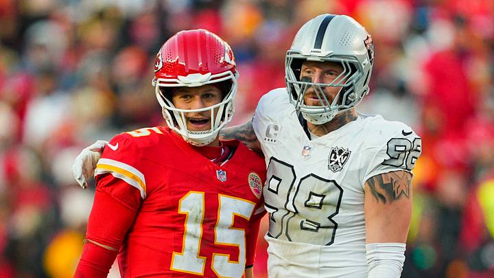 Kansas City Chiefs quarterback Patrick Mahomes (15) and Las Vegas Raiders defensive end Maxx Crosby (98) embrace Kansas City Chiefs quarterback Patrick Mahomes (15) and Las Vegas Raiders defensive end Maxx Crosby (98) embrace