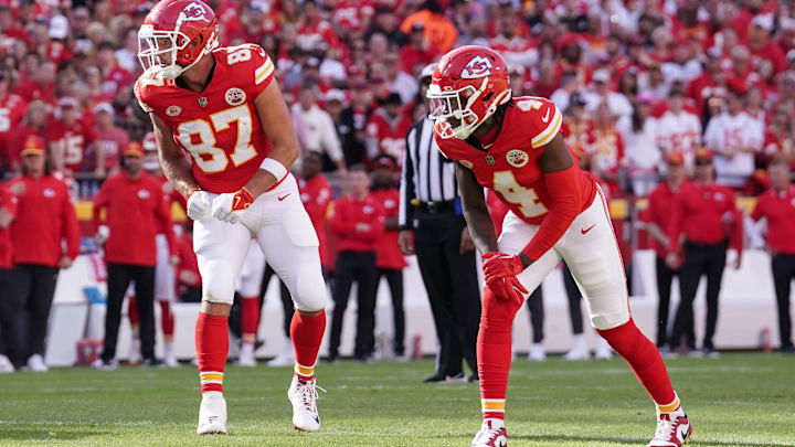 Oct 12, 2023; Kansas City, Missouri, USA; Kansas City Chiefs tight end Travis Kelce (87) and wide receiver Rashee Rice (4) line up against the Los Angeles Chargers during the game at GEHA Field at Arrowhead Stadium. Mandatory Credit: Denny Medley-Imagn Images Oct 12, 2023; Kansas City, Missouri, USA; Kansas City Chiefs tight end Travis Kelce (87) and wide receiver Rashee Rice (4) line up against the Los Angeles Chargers during the game at GEHA Field at Arrowhead Stadium. Mandatory Credit: Denny Medley-Imagn Images