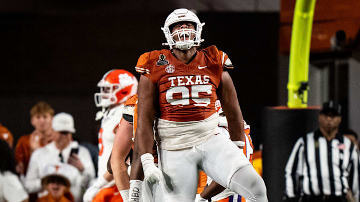 Texas Longhorns defensive lineman Alfred Collins (95) celebrates a quarterback sack in the fourth quarter as the Texas Longhorns play the Clemson Tigers in the first round of the College Football Playoffs.