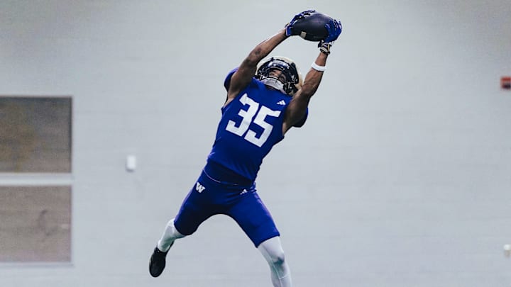Jace Burton reaches for a spring pass in Dempsey Indoor. Jace Burton reaches for a spring pass in Dempsey Indoor.