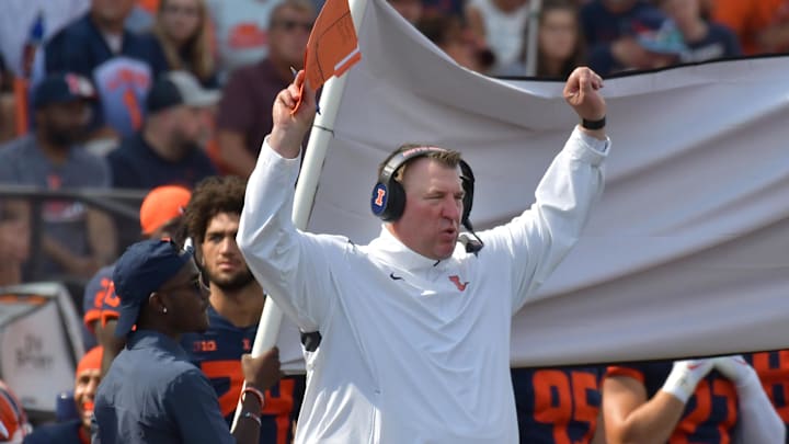 Aug 27, 2022; Champaign, Illinois, USA;  Illinois Fighting Illini head coach Bret Bielema reacts in the first half against Wyoming at Memorial Stadium. Mandatory Credit: Ron Johnson-Imagn Images