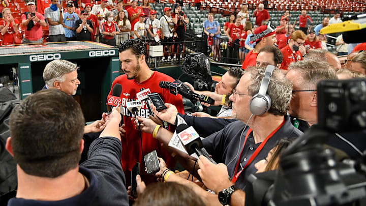 Sep 28, 2021; St. Louis, Missouri, USA;  St. Louis Cardinals third baseman Nolan Arenado (28) talks with the media after the Cardinals defeated the Milwaukee Brewers winning their 17th straight game and clinching a wild card spot in the postseason at Busch Stadium. Mandatory Credit: Jeff Curry-Imagn Images