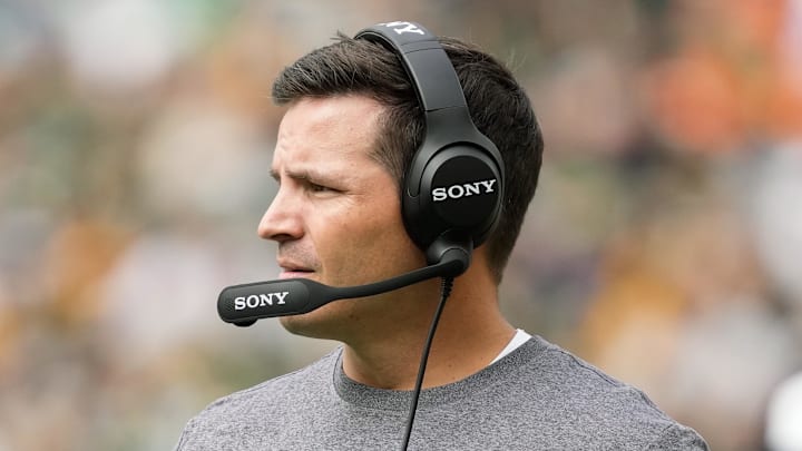 Aug 23, 2025; Green Bay, Wisconsin, USA;  Seattle Seahawks head coach Mike Macdonald looks on during the first quarter against the Green Bay Packers at Lambeau Field. Mandatory Credit: Jeff Hanisch-Imagn Images