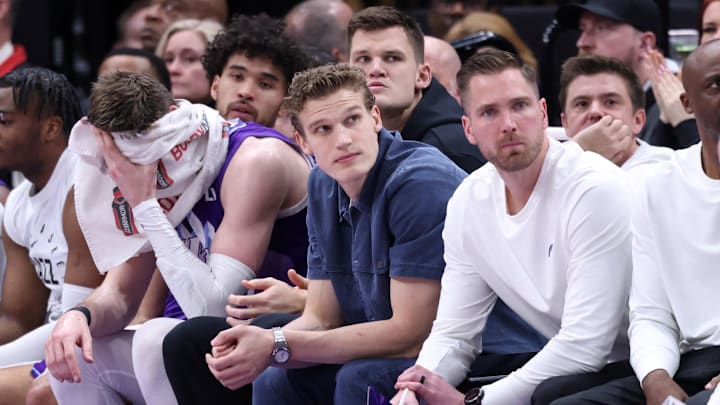 Mar 2, 2025; Salt Lake City, Utah, USA; Utah Jazz forward Lauri Markkanen (center) looks on from the bench during the second half of the game against the New Orleans Pelicans at Delta Center. Mandatory Credit: Rob Gray-Imagn Images