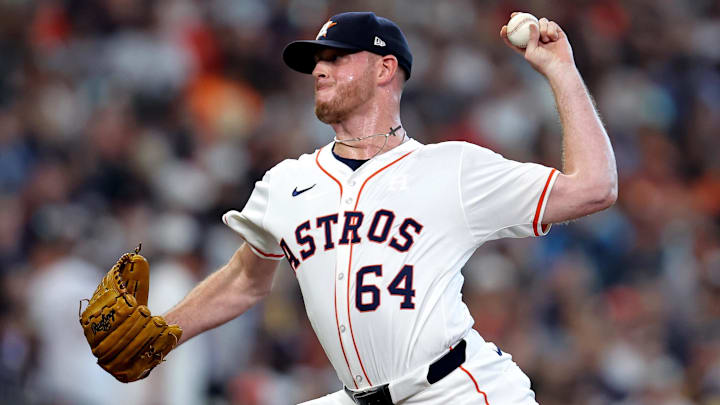Houston Astros relief pitcher Caleb Ferguson (64) delivers a pitch against the Arizona Diamondbacks during the seventh inning at Minute Maid Park. 