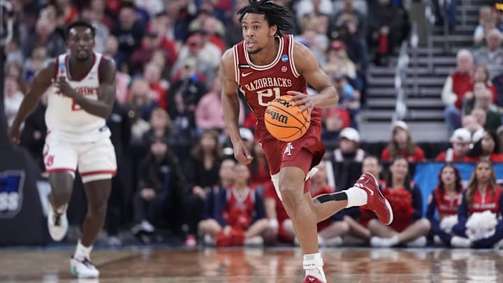 Mar 22, 2025; Providence, RI, USA; Arkansas Razorbacks guard D.J. Wagner (21) dribbles during the second half of a second round men’s NCAA Tournament game against the St. John's Red Storm at Amica Mutual Pavilion. Mandatory Credit: Gregory Fisher-Imagn Images