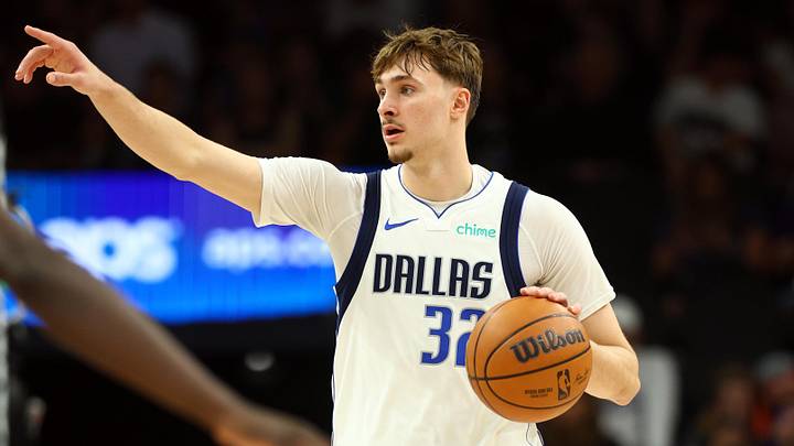 Apr 8, 2026; Phoenix, Arizona, USA; Dallas Mavericks forward Cooper Flagg (32) reacts against the Phoenix Suns in the second half at Mortgage Matchup Center. Apr 8, 2026; Phoenix, Arizona, USA; Dallas Mavericks forward Cooper Flagg (32) reacts against the Phoenix Suns in the second half at Mortgage Matchup Center.