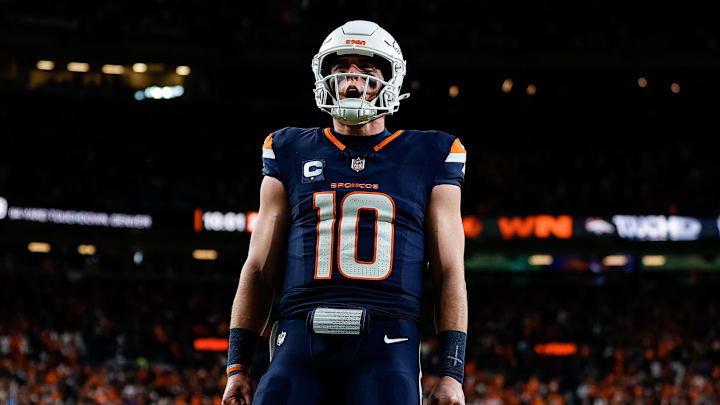 Dec 2, 2024; Denver, Colorado, USA; Denver Broncos quarterback Bo Nix (10) reacts after a play in the third quarter against the Cleveland Browns at Empower Field at Mile High.  