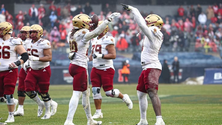 Dec 28, 2024; Bronx, NY, USA; Boston College Eagles defensive back KP Price (20) celebrates an interception with teammates during the first half against the Nebraska Cornhuskers at Yankee Stadium. Mandatory Credit: Vincent Carchietta-Imagn Images Dec 28, 2024; Bronx, NY, USA; Boston College Eagles defensive back KP Price (20) celebrates an interception with teammates during the first half against the Nebraska Cornhuskers at Yankee Stadium. Mandatory Credit: Vincent Carchietta-Imagn Images