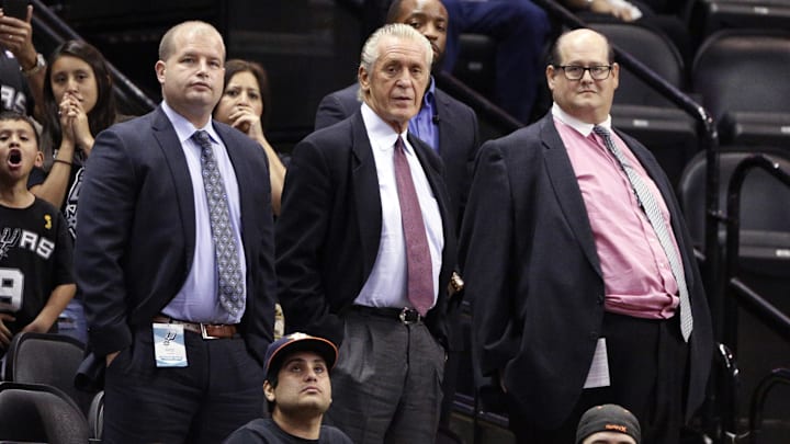 Oct 18, 2014; San Antonio, TX, USA; Miami Heat president Pat Riley (center) watches from the stands during the second half against the San Antonio Spurs at AT&T Center. The Heat won 111-108 in overtime. Mandatory Credit: Soobum Im-Imagn Images