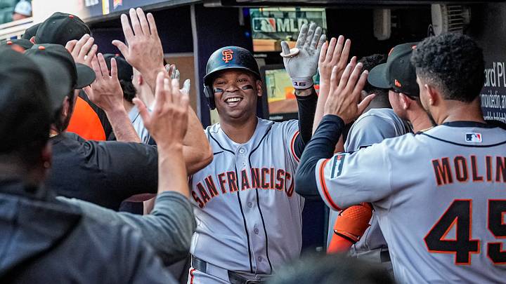 San Francisco Giants designated hitter Rafael Devers (16) reacts in the dugout after hitting a home run.  Credit: Dale Zanine-Imagn Images
