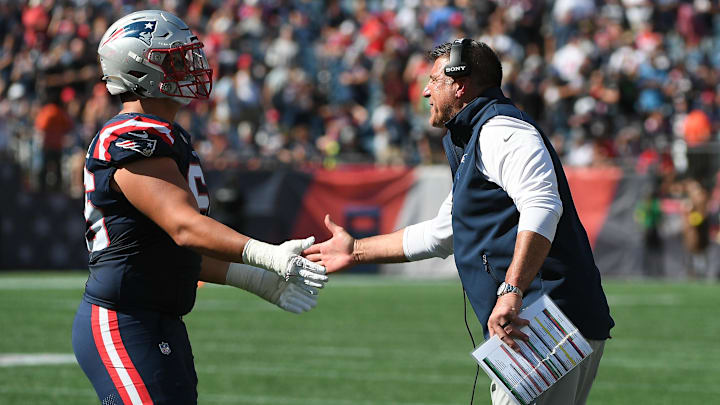 Sep 28, 2025; Foxborough, Massachusetts, USA; New England Patriots head coach Mike Vrable congratulates offensive tackle Will Campbell (66) after a touchdown during the first half against the Carolina Panthers at Gillette Stadium. Mandatory Credit: Bob DeChiara-Imagn Images Sep 28, 2025; Foxborough, Massachusetts, USA; New England Patriots head coach Mike Vrable congratulates offensive tackle Will Campbell (66) after a touchdown during the first half against the Carolina Panthers at Gillette Stadium. Mandatory Credit: Bob DeChiara-Imagn Images