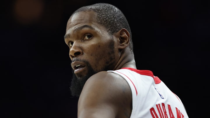 Houston Rockets forward Kevin Durant (7) looks on during overtime against the Philadelphia 76ers