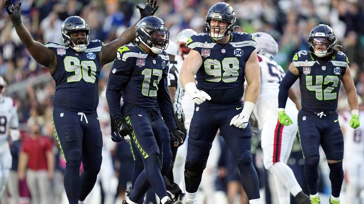 Seattle Seahawks defensive tackle Rylie Mills (98) reacts after sacking New England Patriots quarterback Drake Maye (10) during the second quarter in Super Bowl LX.