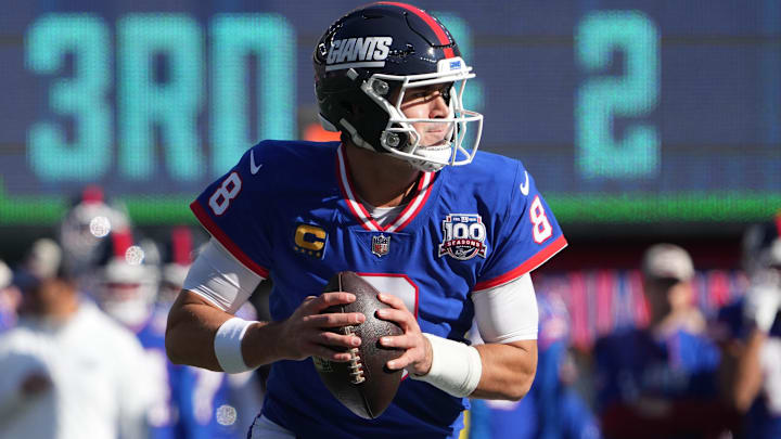 Nov 3, 2024; East Rutherford, New Jersey, USA; New York Giants quarterback Daniel Jones (8) against the Washington Commanders during the first quarter at MetLife Stadium.