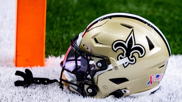 Sep 8, 2024; New Orleans, Louisiana, USA; Detailed view of the New Orleans Saints football helmet before the game against the Carolina Panthers during the pregame at Caesars Superdome. Mandatory Credit: Stephen Lew-Imagn Images Sep 8, 2024; New Orleans, Louisiana, USA; Detailed view of the New Orleans Saints football helmet before the game against the Carolina Panthers during the pregame at Caesars Superdome. Mandatory Credit: Stephen Lew-Imagn Images