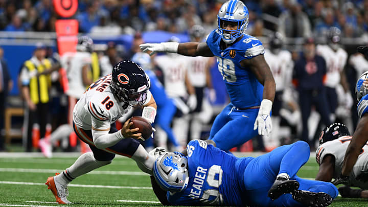  Detroit Lions defensive tackle DJ Reader (98) sacks Chicago Bears quarterback Caleb Williams (18).