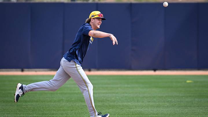 Milwaukee Brewers shortstop Cooper Pratt throws to first base during spring training on February 17, 2025, at American Family Fields of Phoenix in Phoenix, Arizona. Milwaukee Brewers shortstop Cooper Pratt throws to first base during spring training on February 17, 2025, at American Family Fields of Phoenix in Phoenix, Arizona.