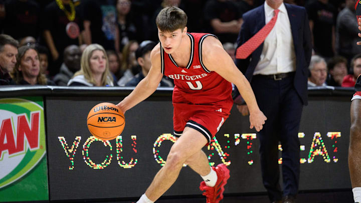 Feb 9, 2025; College Park, Maryland, USA; Rutgers Scarlet Knights guard Jordan Derkack (0) handles the ball during the first half against the Maryland Terrapins at Xfinity Center. Mandatory Credit: Reggie Hildred-Imagn Images Feb 9, 2025; College Park, Maryland, USA; Rutgers Scarlet Knights guard Jordan Derkack (0) handles the ball during the first half against the Maryland Terrapins at Xfinity Center. Mandatory Credit: Reggie Hildred-Imagn Images