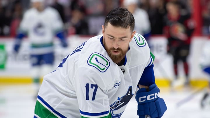 Nov 23, 2024; Ottawa, Ontario, CAN; Vancouver Canucks defenseman Filip Hronek (17) skates with the puck during warmup prior to game against the Ottawa Senators at the Canadian Tire Centre. Mandatory Credit: Marc DesRosiers-Imagn Images